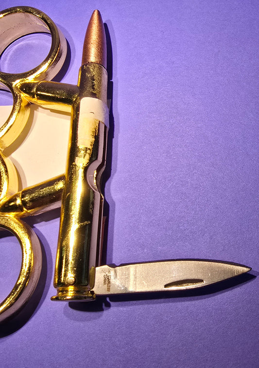 GOLD BULLE W/ KNIFE BRASS KNUCKLES