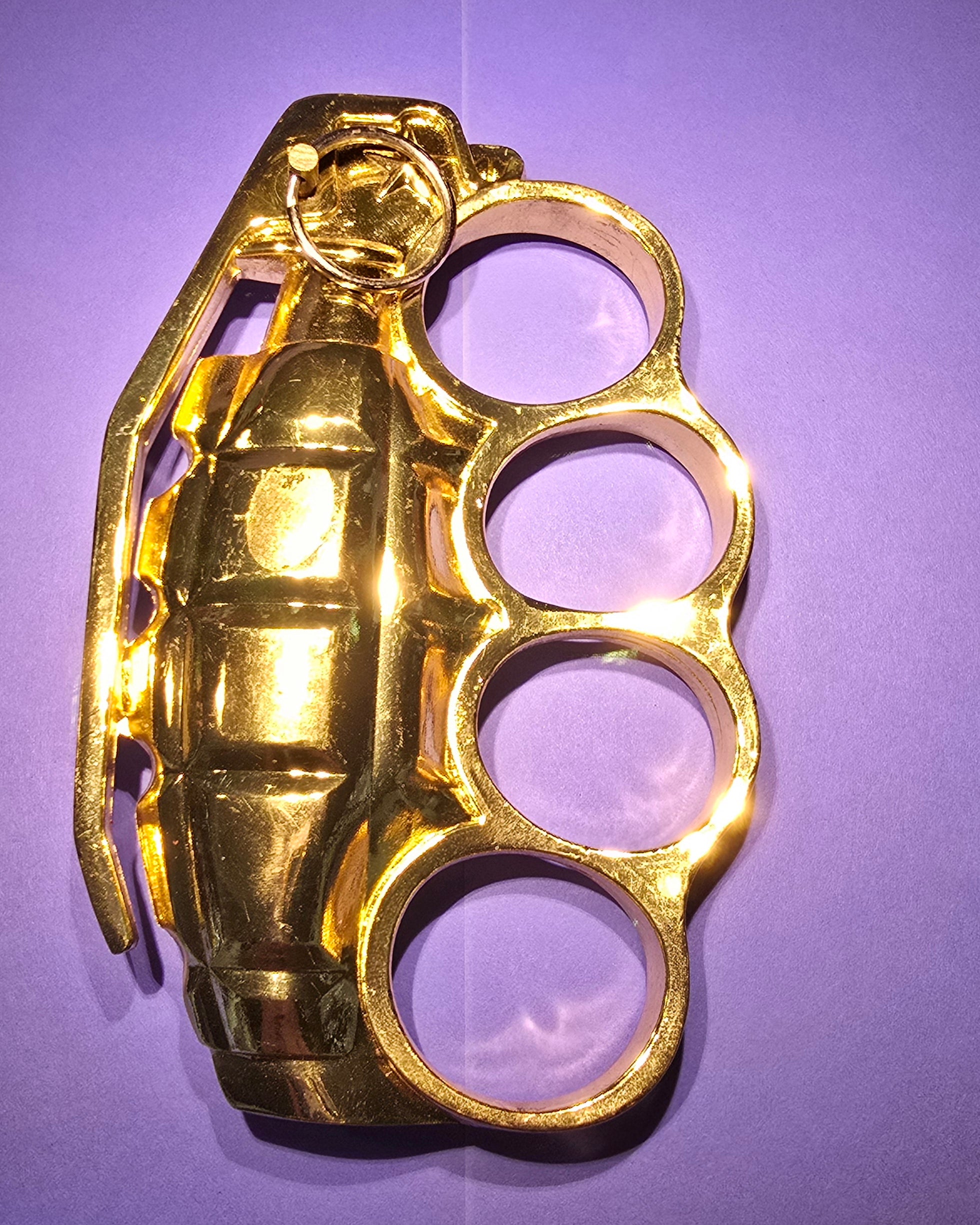 GOLD GRENADE PAPERWEIGHT