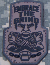 EMBRACE THE GRIND PVC MORALE PATCH
